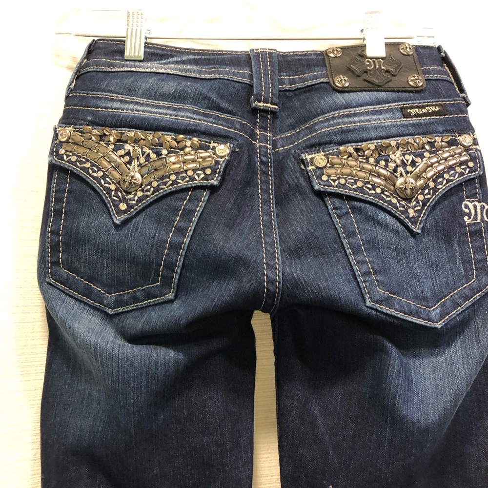 Miss Me Jeans with back pocket detail.